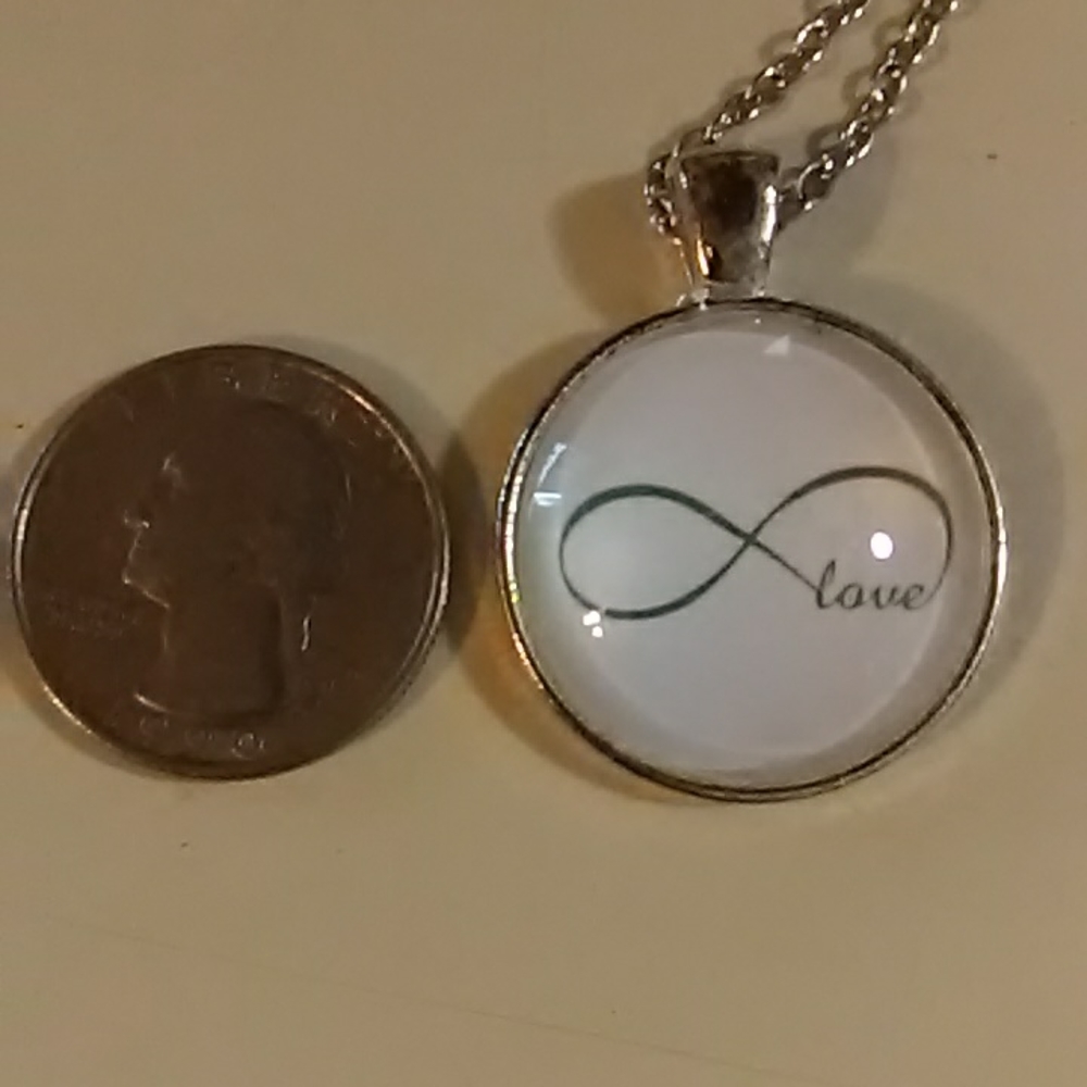 Xfinity symbol Cabochon Necklace
